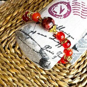 Red beaded gemstones bracelet